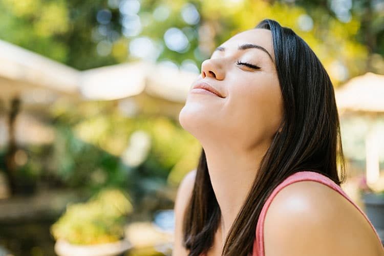 Woman Breathing Fresh Air